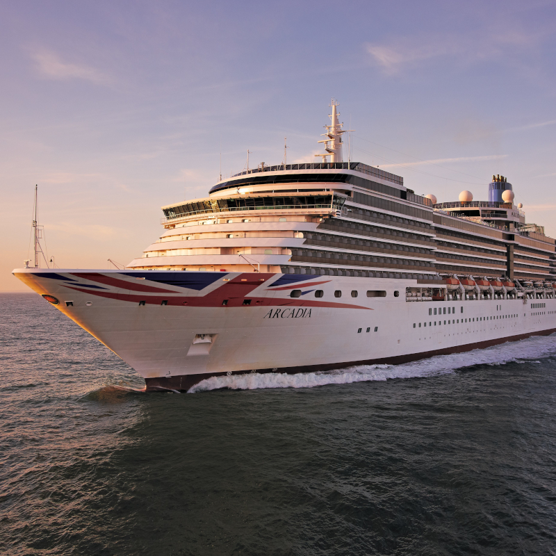 P&O-Cruises-Arcadia The P&O cruise ship Arcadia sailing on open blue waters at sunset.